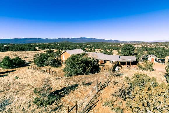 4.97 Acres of Residential Land with Home for Sale in Tijeras, New Mexico