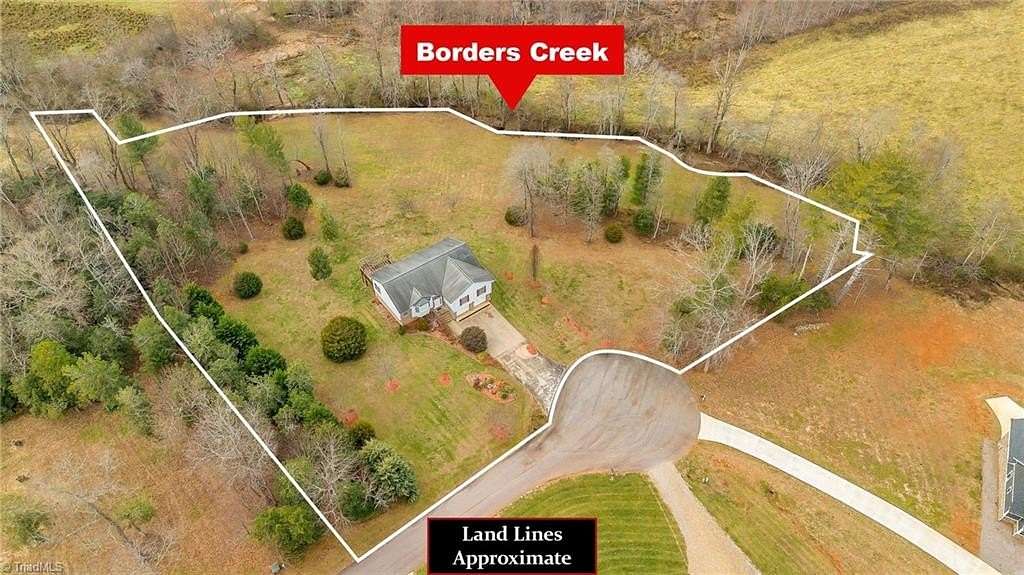 2.7 Acres of Residential Land with Home for Sale in Purlear, North Carolina