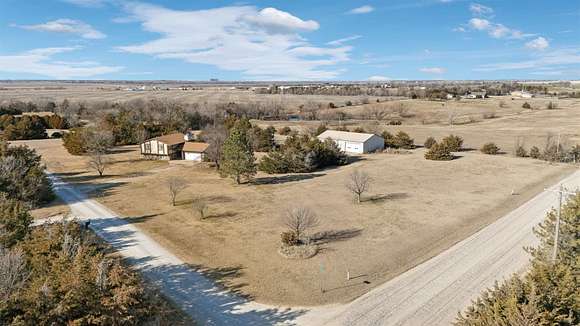 3.9 Acres of Residential Land with Home for Sale in Wellington, Kansas