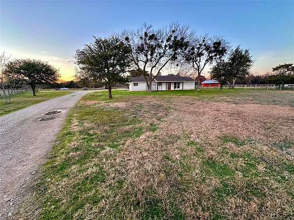 2.001 Acres of Residential Land with Home for Sale in Lucas, Texas