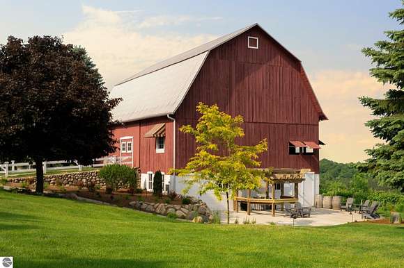 96 Acres of Agricultural Land with Home for Sale in Suttons Bay, Michigan