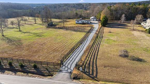 41.9 Acres of Agricultural Land with Home for Sale in Clinton, South Carolina