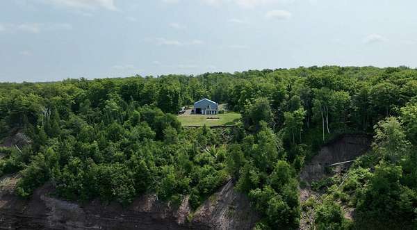 18 Acres of Land with Home for Sale in Houghton, Michigan