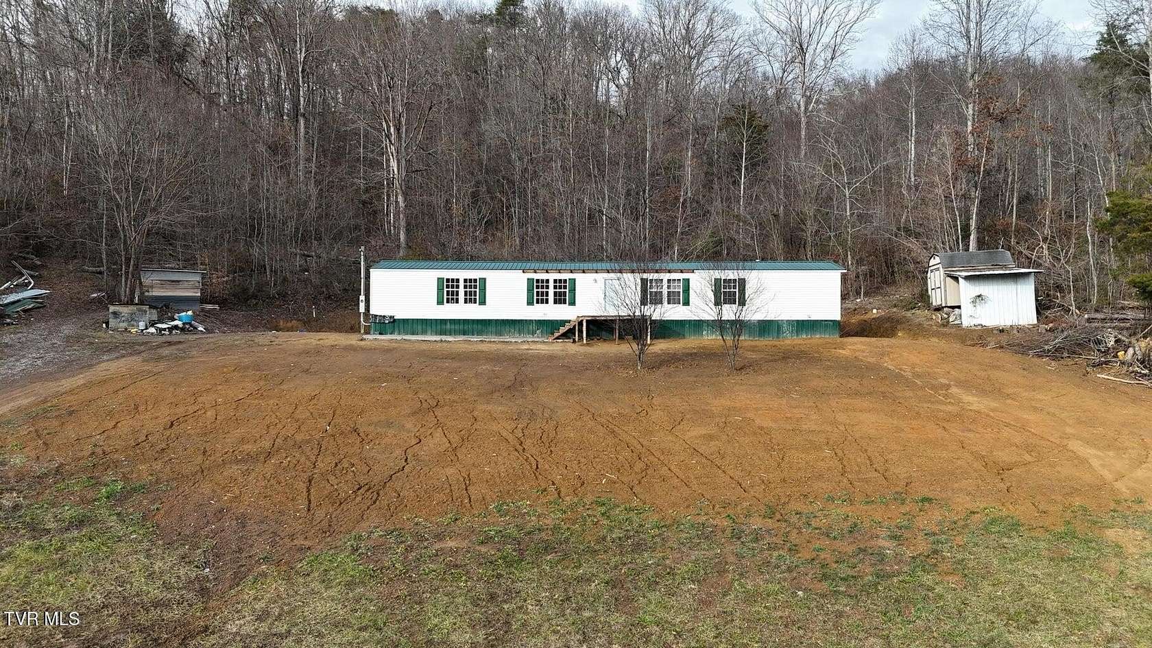 10.6 Acres of Land with Home for Sale in Surgoinsville, Tennessee