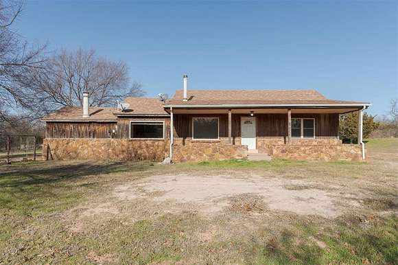 14.95 Acres of Land with Home for Sale in Harrah, Oklahoma