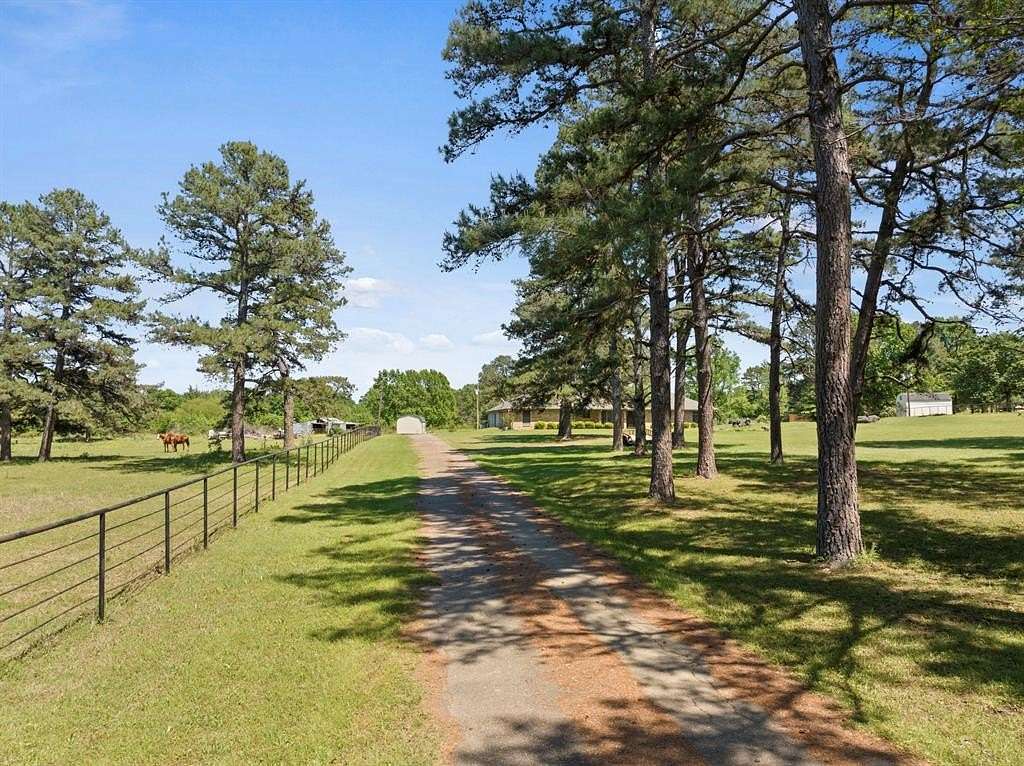 15.7 Acres of Land with Home for Sale in Mount Pleasant, Texas