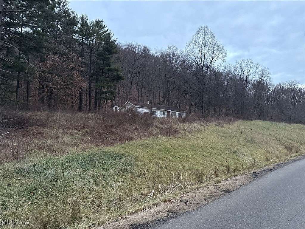 2.371 Acres of Residential Land with Home for Sale in Uhrichsville, Ohio