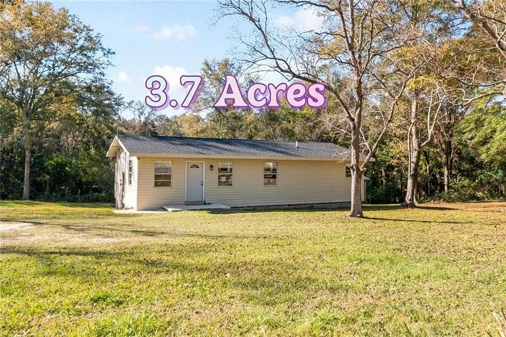 3.7 Acres of Residential Land with Home for Sale in Semmes, Alabama