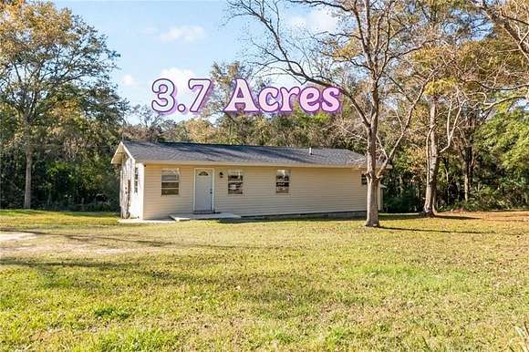 3.7 Acres of Residential Land with Home for Sale in Semmes, Alabama