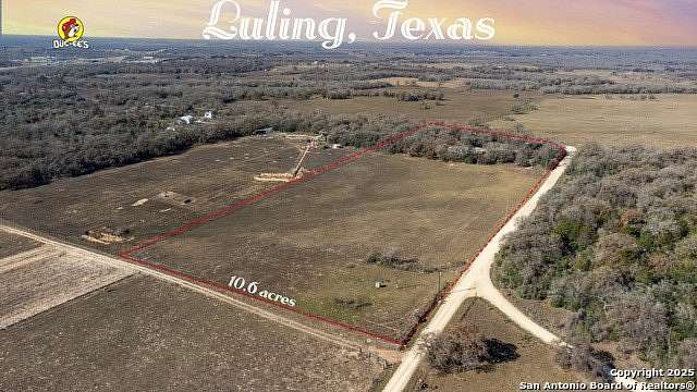 10.6 Acres of Land with Home for Sale in Luling, Texas