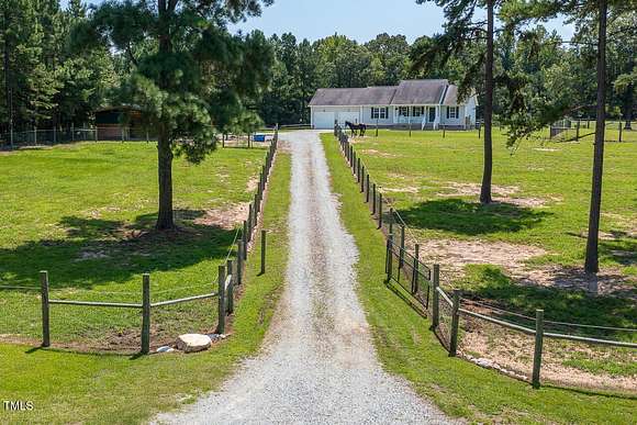 8.14 Acres of Land with Home for Sale in Rougemont, North Carolina