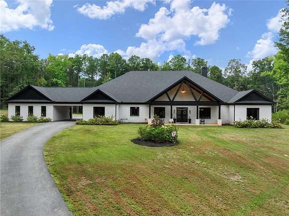 12.57 Acres of Land with Home for Sale in Loganville, Georgia