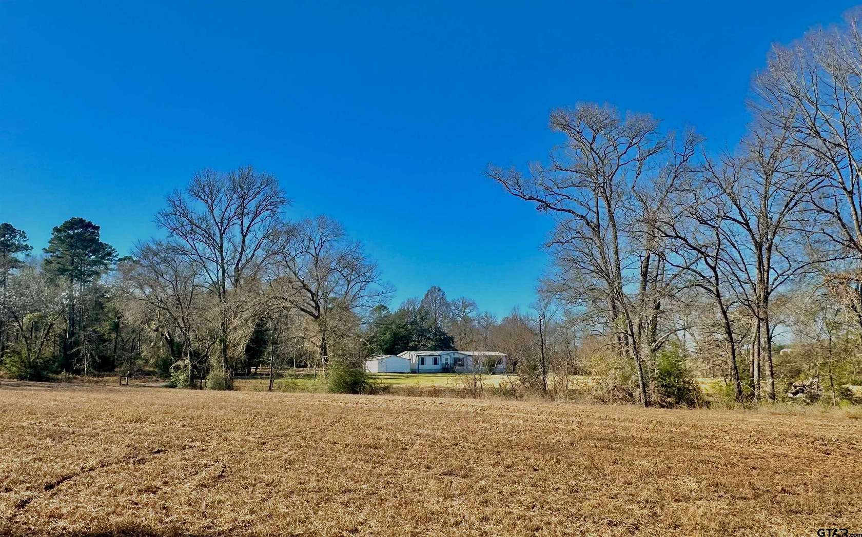 33.5 Acres of Land with Home for Sale in Elkhart, Texas