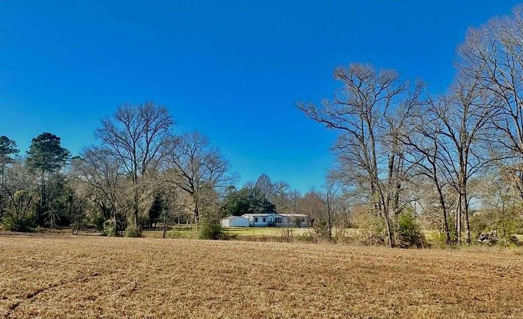 33.5 Acres of Land with Home for Sale in Elkhart, Texas