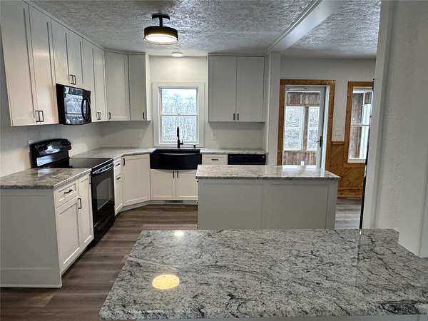 5 Acres of Residential Land with Home for Sale in Orient, Iowa