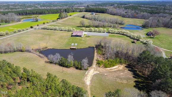 60 Acres of Agricultural Land with Home for Sale in Stem, North Carolina