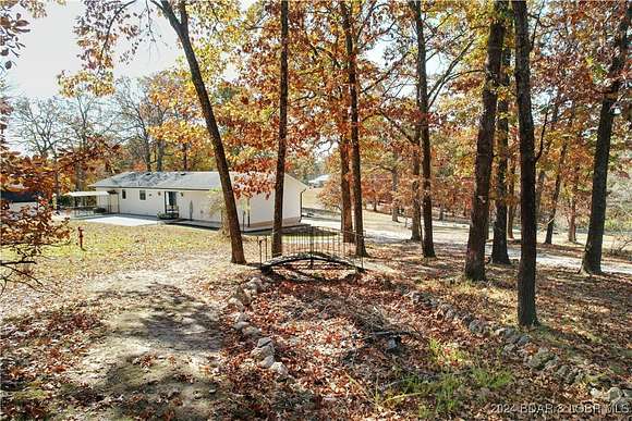 3.44 Acres of Residential Land with Home for Sale in Gravois Mills, Missouri