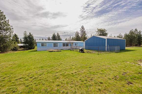 4.06 Acres of Residential Land with Home for Sale in Elk, Washington