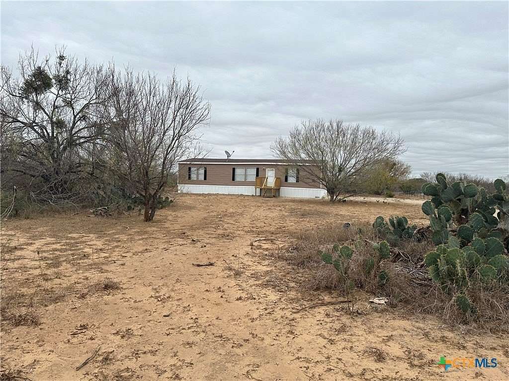 10 Acres of Residential Land with Home for Sale in Moore, Texas