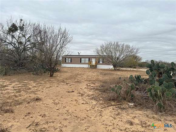 10 Acres of Residential Land with Home for Sale in Moore, Texas