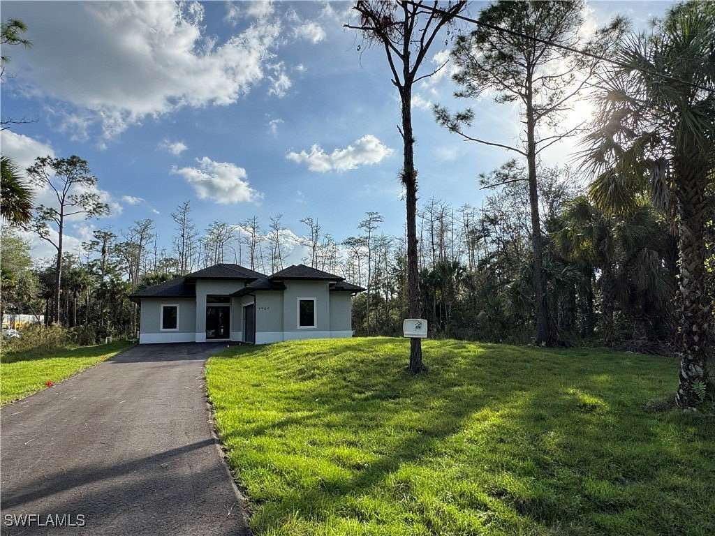 2.39 Acres of Residential Land with Home for Sale in Naples, Florida