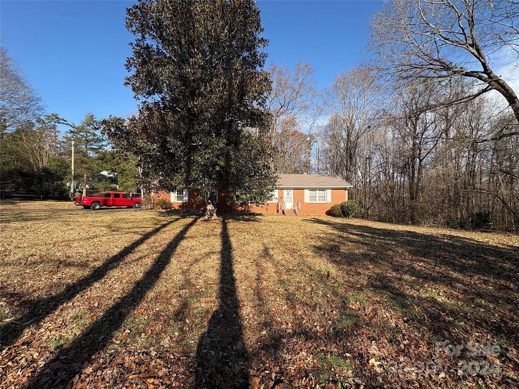 3.27 Acres of Residential Land with Home for Sale in Matthews, North Carolina