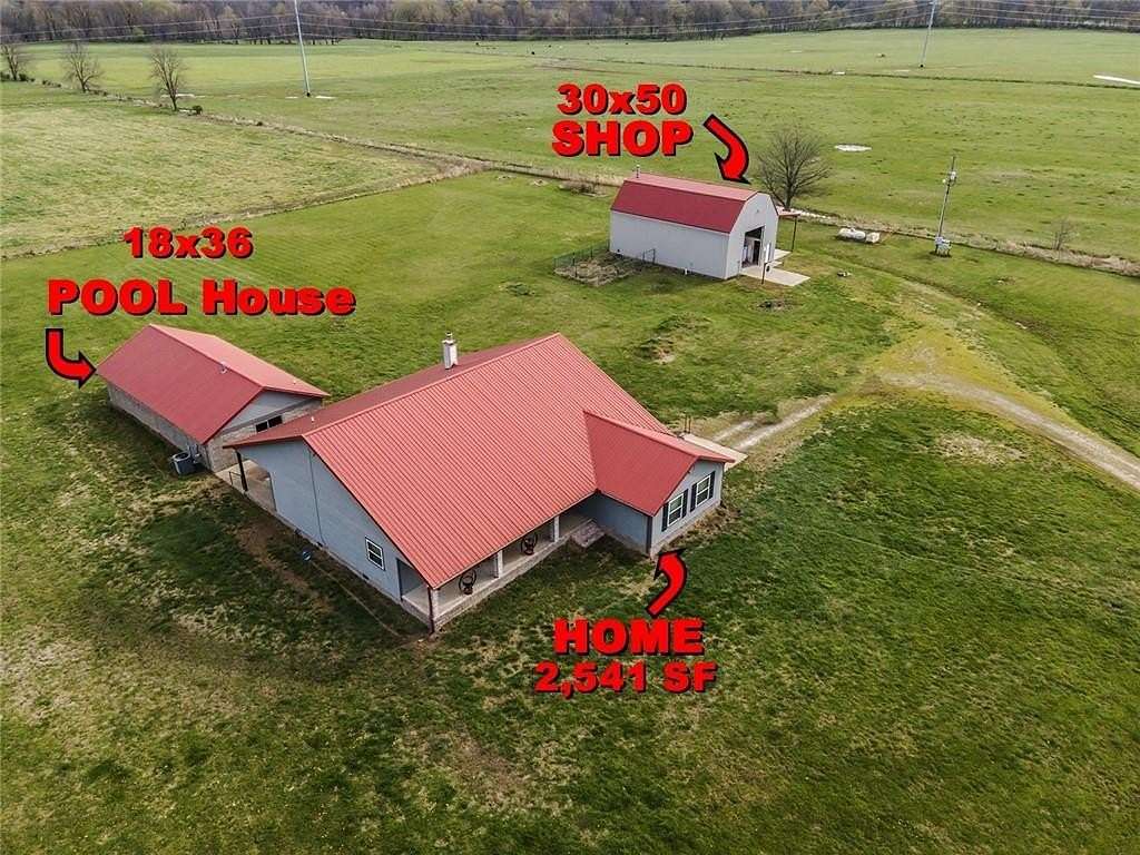 6 Acres of Residential Land with Home for Auction in Prairie Grove, Arkansas