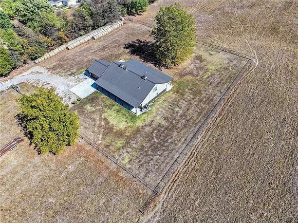 5 Acres of Residential Land with Home for Sale in Gentry, Arkansas