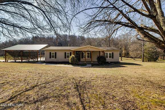 3.9 Acres of Residential Land with Home for Sale in Athens, Tennessee