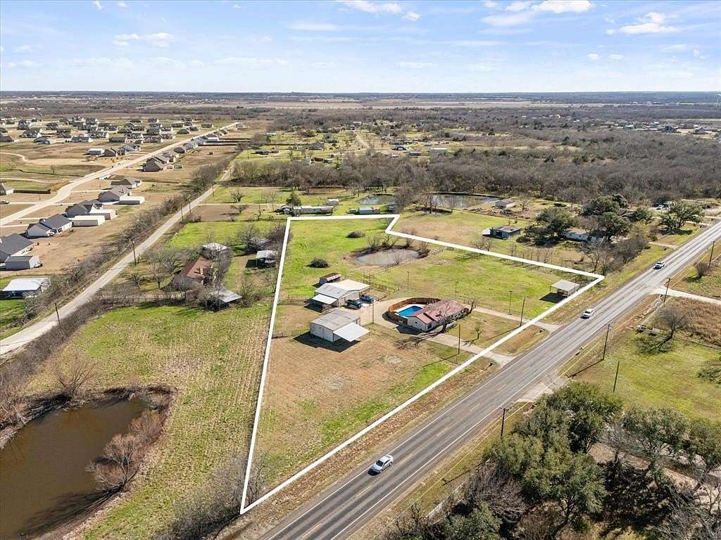 3.95 Acres of Land with Home for Sale in Oak Ridge, Texas