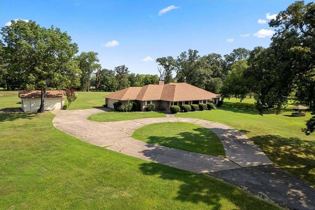 8.5 Acres of Residential Land with Home for Sale in Mount Pleasant, Texas