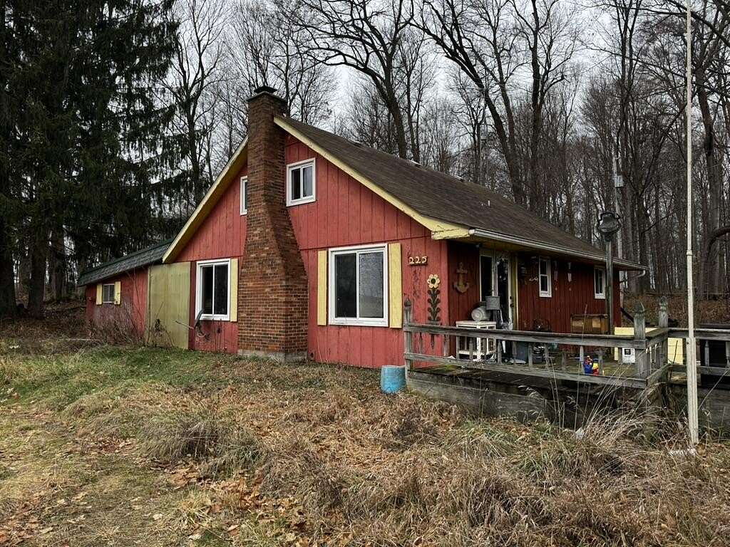 14.04 Acres of Land with Home for Sale in Leslie, Michigan