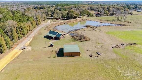 10 Acres of Recreational Land with Home for Sale in Jay, Florida