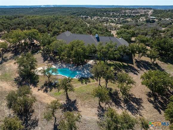 21.398 Acres of Land with Home for Sale in Marble Falls, Texas