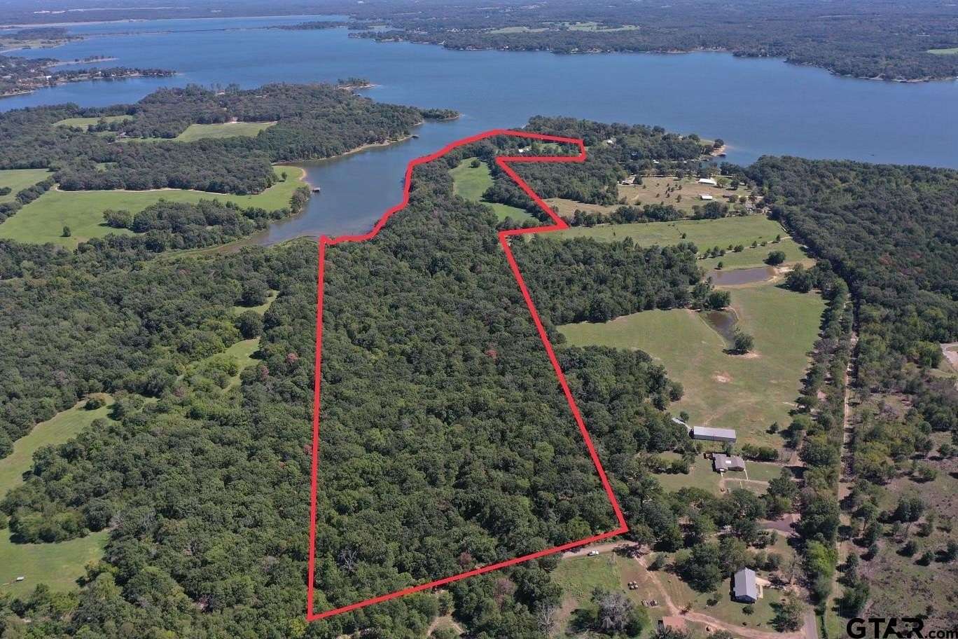 68.38 Acres of Recreational Land with Home for Sale in Pittsburg, Texas