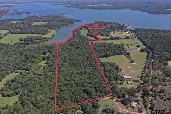 68.4 Acres of Recreational Land with Home for Sale in Pittsburg, Texas