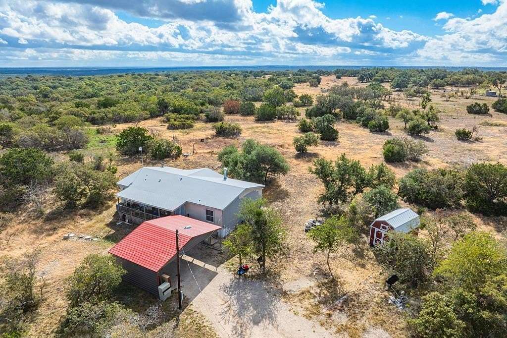 5 Acres of Residential Land with Home for Sale in Mountain Home, Texas