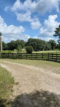 4.65 Acres of Residential Land with Home for Sale in Groveland, Florida