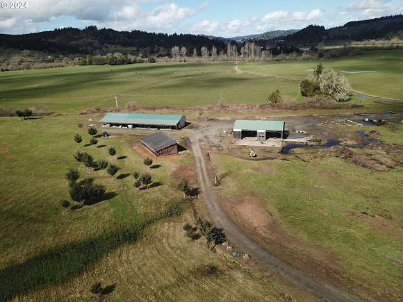 6.7 Acres of Improved Commercial Land for Sale in Myrtle Point, Oregon