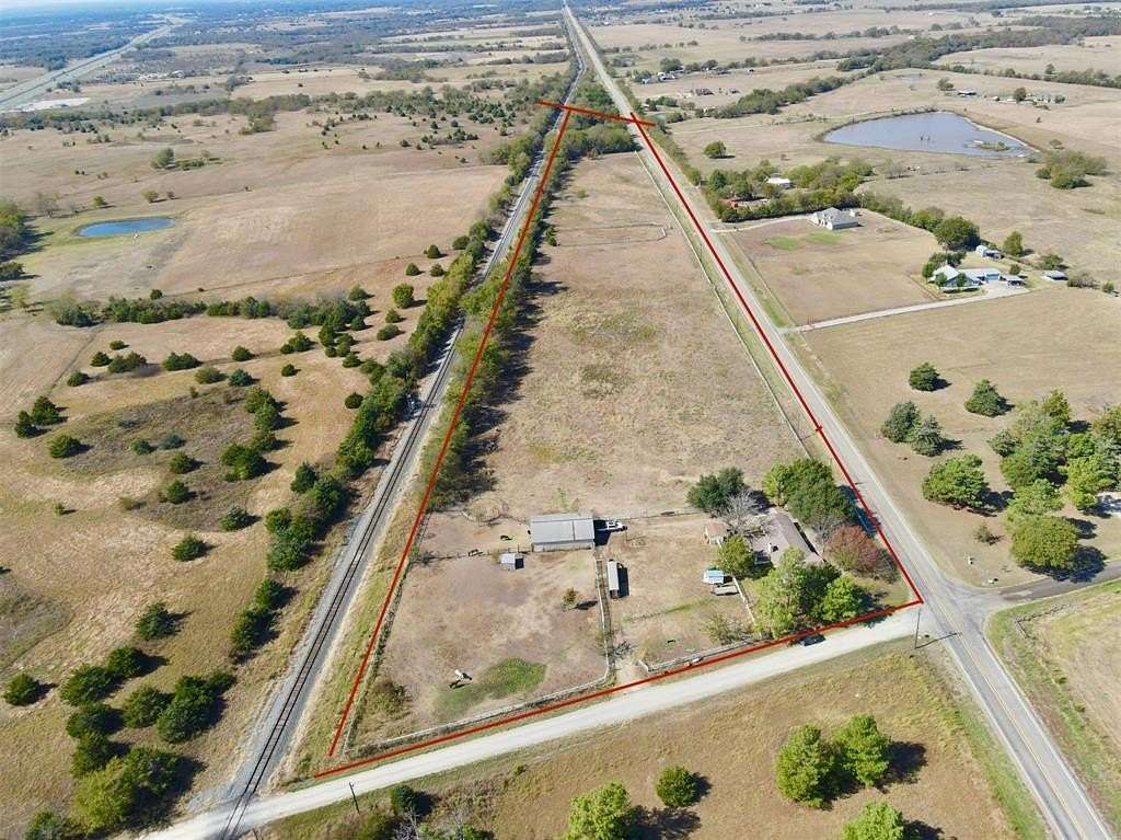 11.78 Acres of Land with Home for Sale in Campbell, Texas