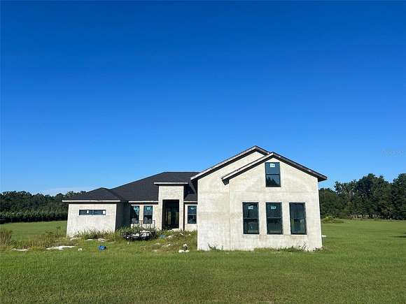 5.56 Acres of Land with Home for Sale in High Springs, Florida