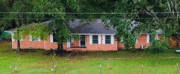 4.9 Acres of Residential Land with Home for Sale in Zavalla, Texas