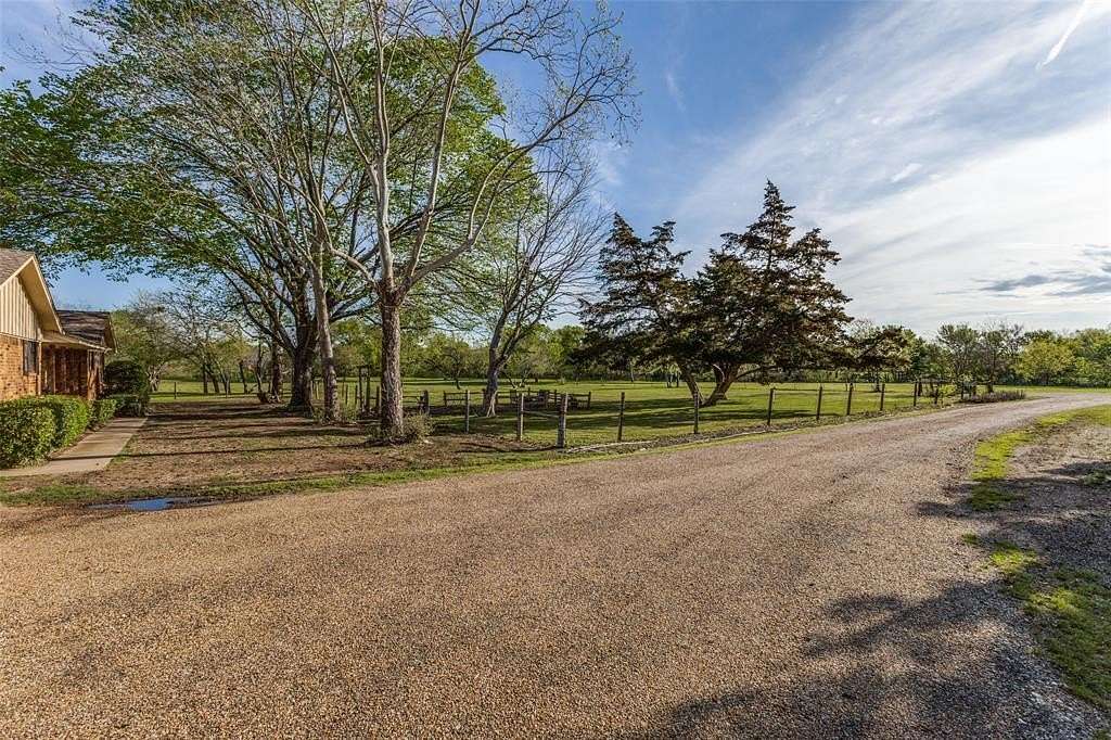 4.153 Acres of Residential Land with Home for Sale in Sachse, Texas