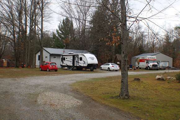 10.34 Acres of Recreational Land with Home for Sale in Frederic, Michigan