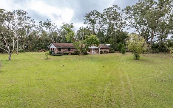 26 Acres of Agricultural Land with Home for Sale in O'Brien, Florida