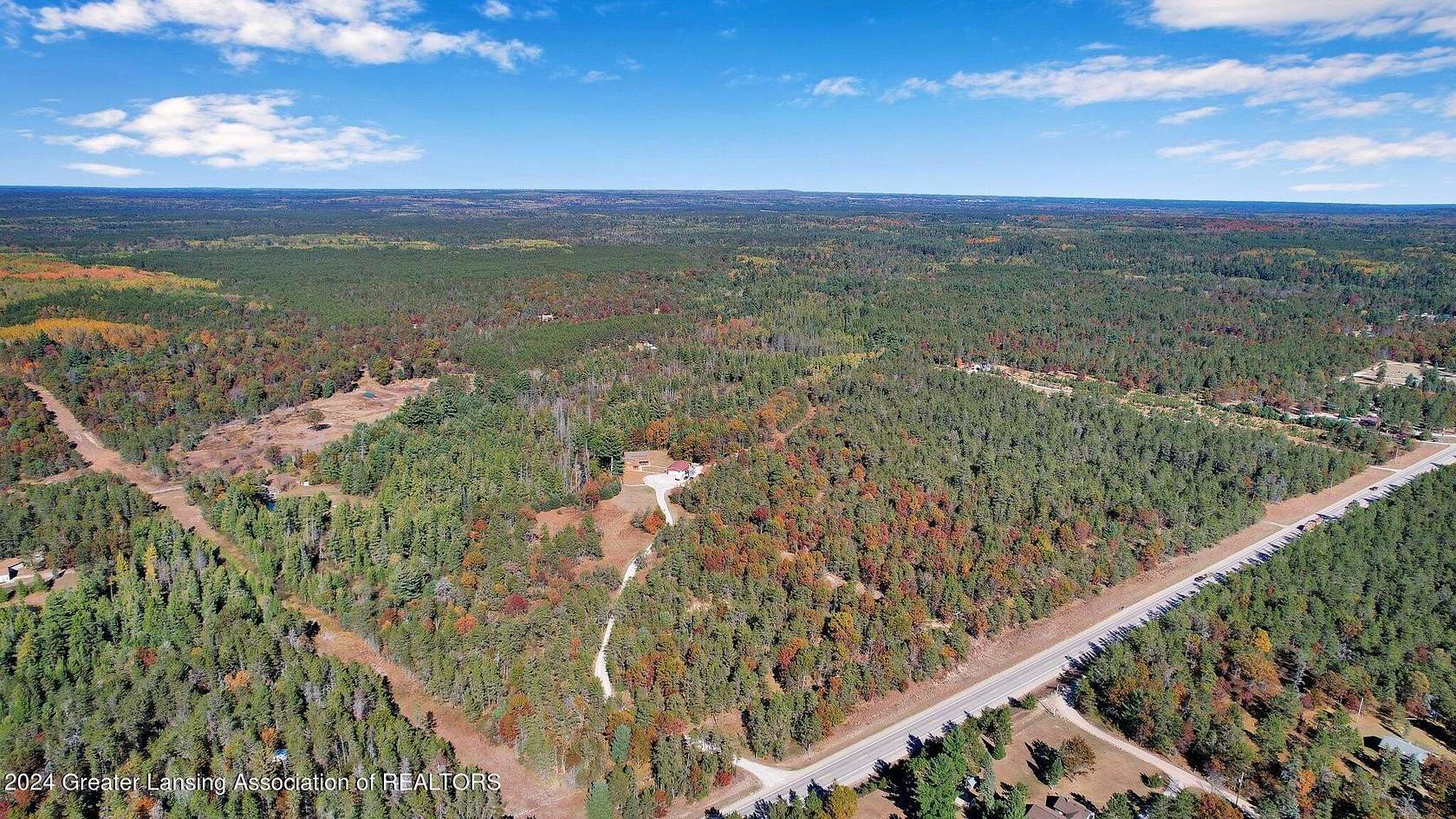 32 Acres of Recreational Land with Home for Sale in Luzerne, Michigan