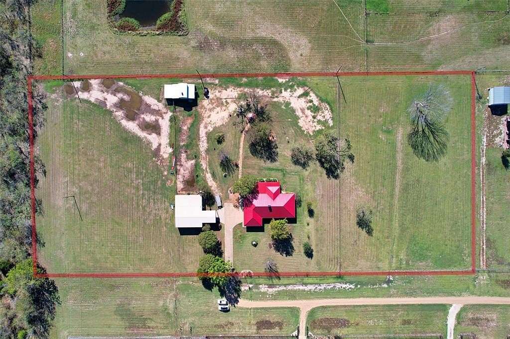 4.62 Acres of Residential Land with Home for Sale in Terrell, Texas