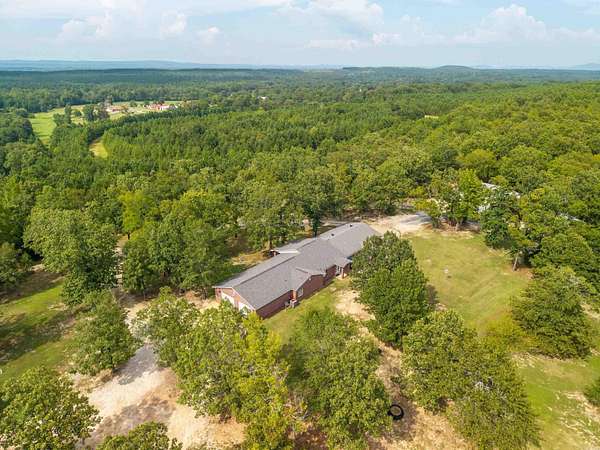 5.65 Acres of Residential Land with Home for Sale in Bonnerdale, Arkansas