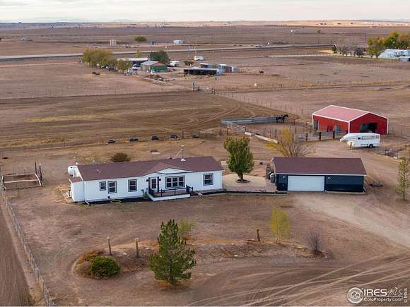 5 Acres of Land with Home for Sale in Pierce, Colorado