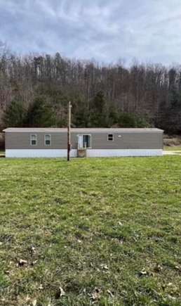 10.5 Acres of Land with Home for Sale in Campton, Kentucky